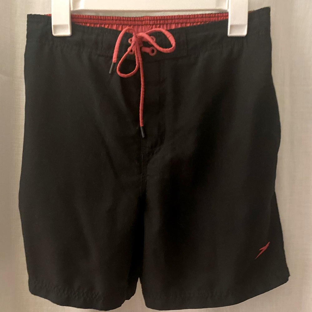 Speedo- men’s swim trunk, a stretch boxer brief liner, drawstring swim short.